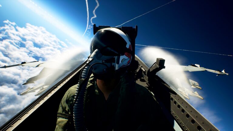 First-person perspective from the cockpit of a fighter jet in Ace Combat 8: Wings of Theve, with clouds and another jet in the background.