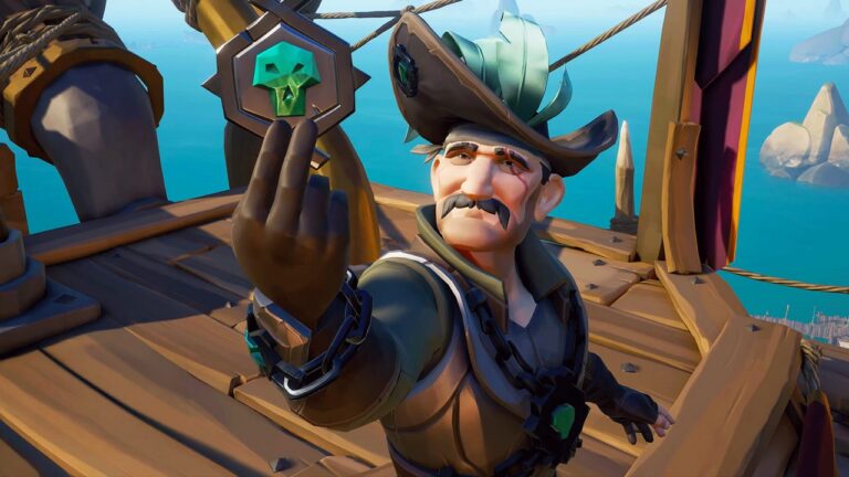 A pirate from Sea of Thieves holds up a glowing amulet with a skull symbol on the deck of a ship.