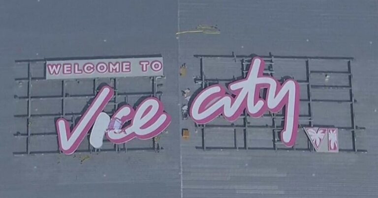 Close-up of the pink 'Welcome to Vice City' lettering on the roof of the Kaseya Center in Miami