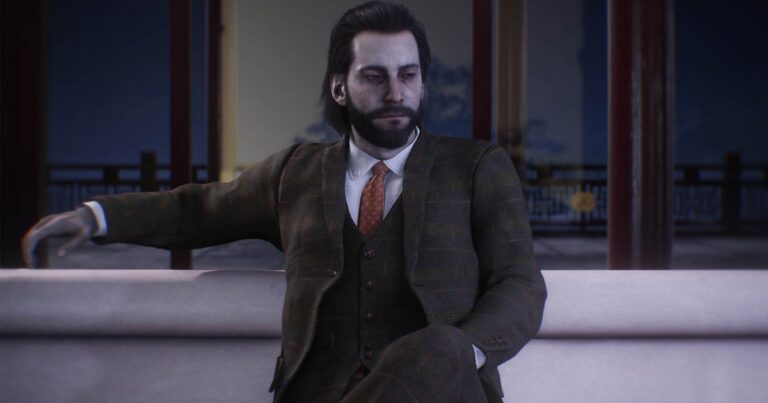 Logan a.k.a. Wolverine sits thoughtfully on a sofa in Marvel's Wolverine